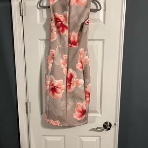 Worn 1 time and perfect for any event; fits well and very flattering